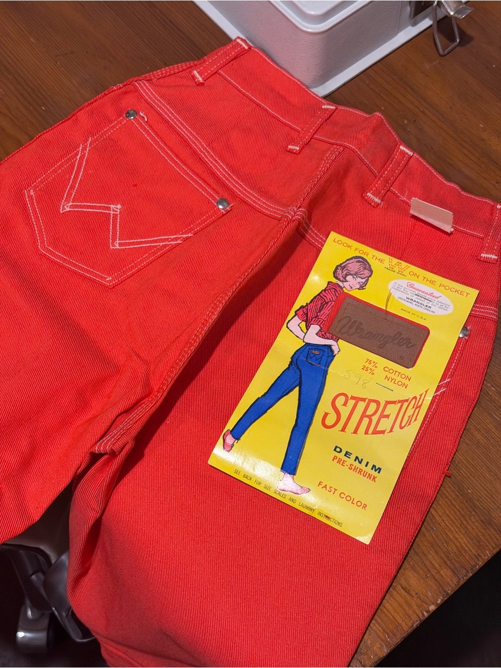 Dead stock new with tag 60s Wrangler Women’s High-Rise Slim Jeans in Orange-Red